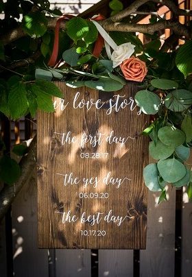 Wood Sign with Our Love Story message